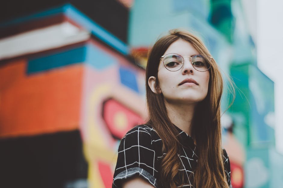 Shallow Focus of Woman Wearing Black and White T-shirt